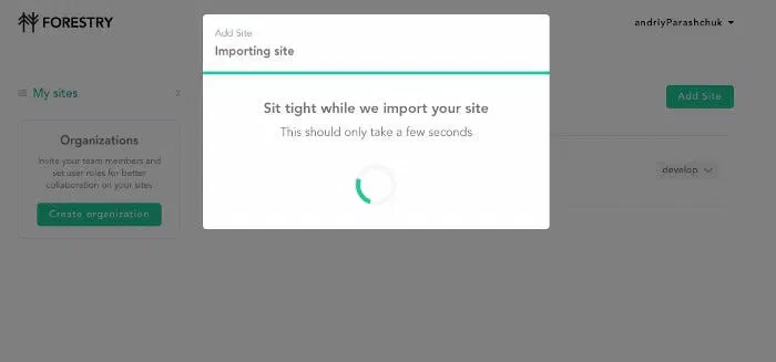 Forestry dialog with a spinner reading Sit tight while we import your site