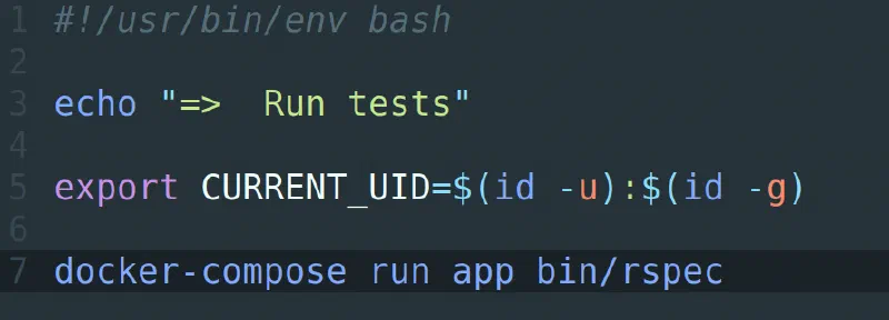 Bash script that exports the current user id and runs docker-compose run app bin/rspec