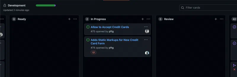 Dark project board with Ready, In Progress and Review lists and two cards in progress